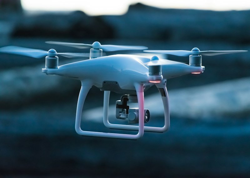Drone Cinematographer On City Rooftop